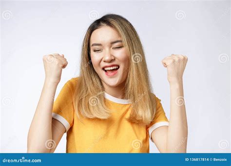 Young Asian Woman With Surprised Excited Happy Screaming Cheerful Girl