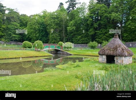 Traditional Garden with Japanese style bridge Stock Photo - Alamy