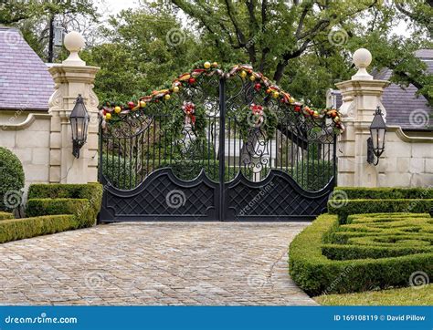 Driveway Entrance Gate Decorated For Christmas In Highland Park Texas