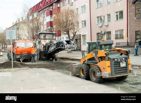 Construction works on city road Stock Photo - Alamy