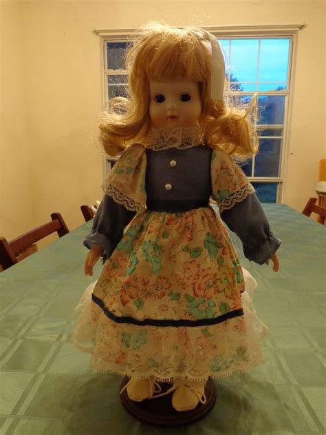 Beautiful Vintage Porcelain Doll With Blonde Hair And Blue Eyes