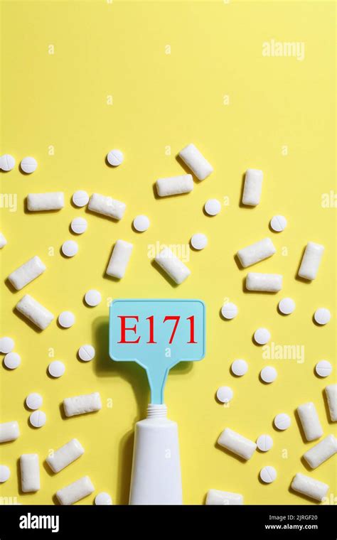Titanium dioxide, E171, dangerous additive concept. gum, pills ...