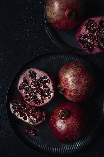 Premium Photo High Angle View Of Sliced Pomegranates