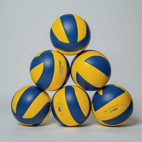A Stack Of Blue And Yellow Volleyballs With The Word Quot Blue And