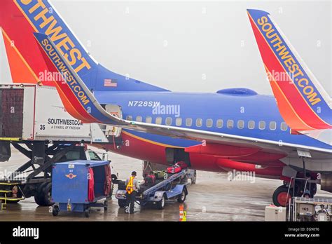 Chicago, Illinois - A member of the Southwest Airlines ground crew at ...