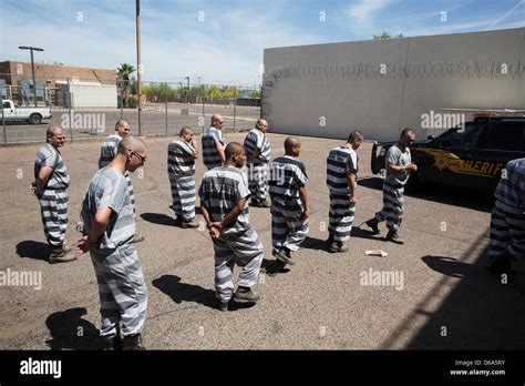 Male inmates return to Estrella Jail after chain gang duty Stock Photo - Alamy