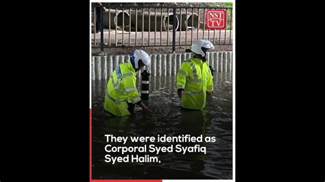 Brave Quick Thinking Policemen Saves Motorist Stuck In Flash Flood