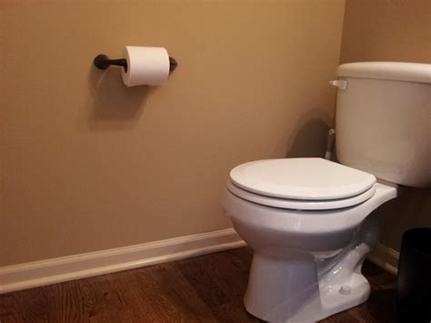 How To Install A Toilet Paper Holder In A Bathroom Dengarden