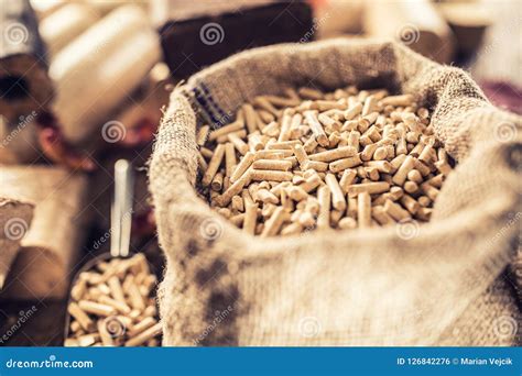 Wooden Pressed Pellets And Briquettes From Biomass Stock Photo Image