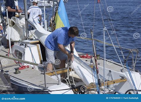 Men Yachtsmen Prepare Rigging of a Sailing Yacht before Race Editorial Stock Image - Image of ...