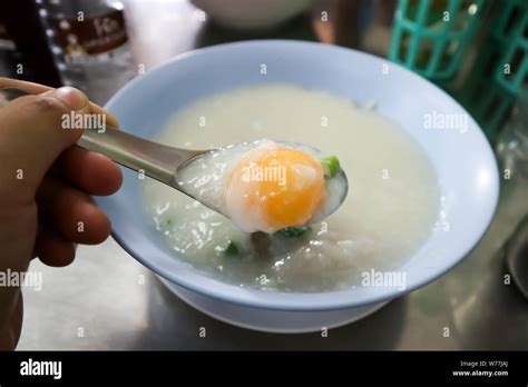 Eating Rice Gruel Rice Porridge Or Congee Dish Stock Photo Alamy