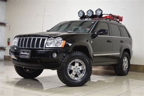 JEEP GRAND CHEROKEE OVERLAND LIFTED 4X4 5 7L V8 HEMI NAVI BCKUP CAM