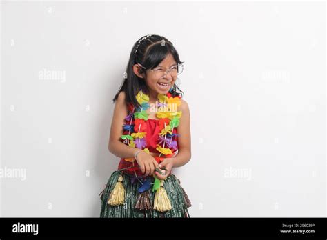 Year Old Latina Brunette Girl With Glasses And Hawaiian Skirt Enjoys Dancing And Does Hawaii