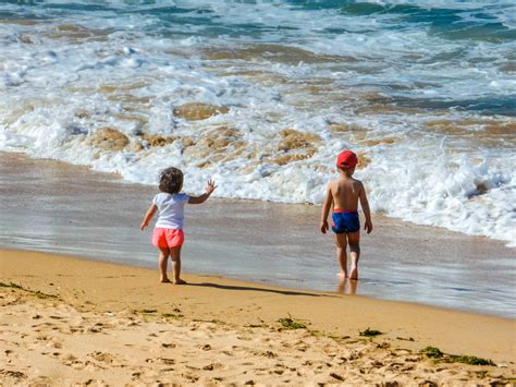 Fotos gratis costa Oceano niña sol apuntalar ola verano