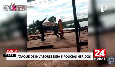 Iquitos policías e invasores se enfrentan en