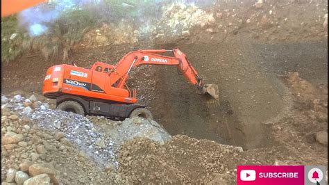 The Hill Of Gravel Sand Doosan 140wv Wheels Excavator Machine