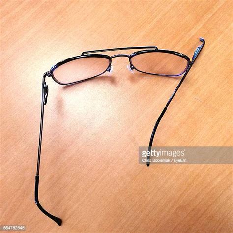 Broken Reading Glasses Photos And Premium High Res Pictures Getty Images