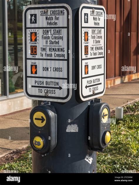 Crosswalk Pedestrian Sign And Buttons On A Pole On Penn Avenue In