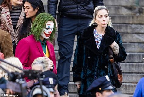 Lady Gaga Plants A Kiss On A Female Bystander As She Shoots A Scene For