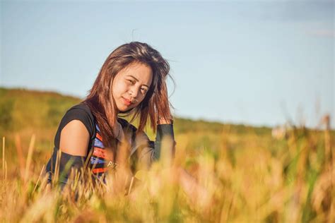 3840x2562 Girl Grass Field Smile Summer 4k Wallpaper