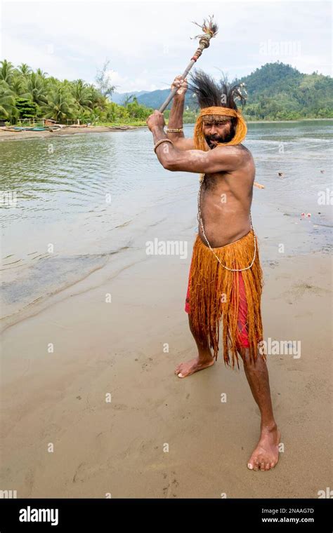 Village Man Preparing To Perform Traditional Sing Sing Melanesian