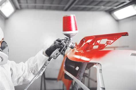 Spray Painter Worker In Protective Glove With Airbrush Pulverizer