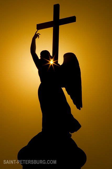 Statue Of Angel With A Cross On Top Of The Alexander Column Statue