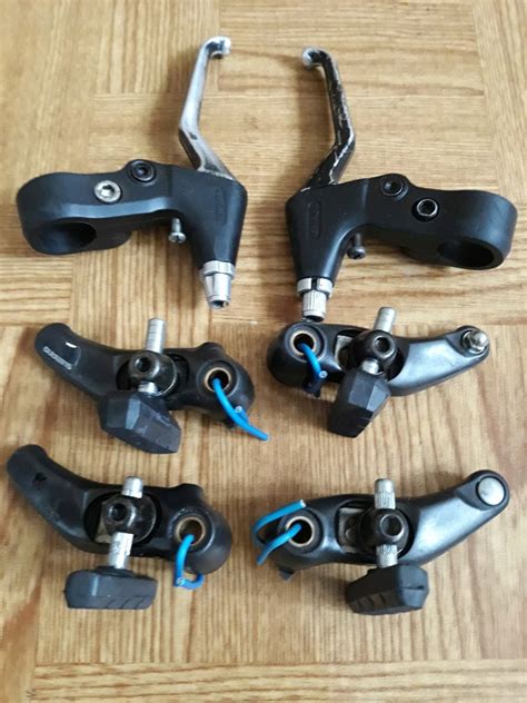 HAMULCE CANTILEVER SHIMANO KOMPLET KLAMKI 11778630713 Oficjalne