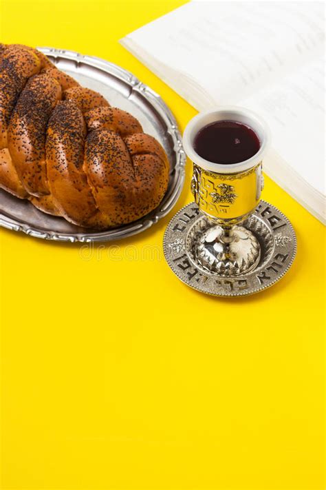 Shabbat Shalom Challah With Glass Of Wine And Book On Yellow Background Not Isolated Copy