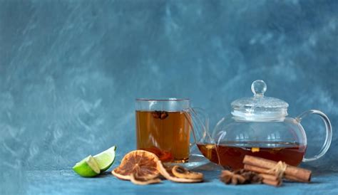 Premium Photo Hot Black Tea In A Glass Teapot And A Cup Of Freshly