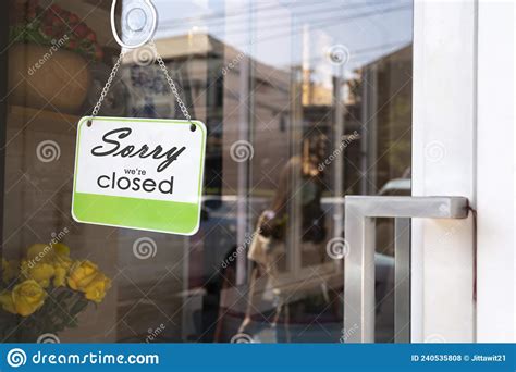 Sorry We`re Closed Sign Board Hanging On Door Of Cafe Stock Photo