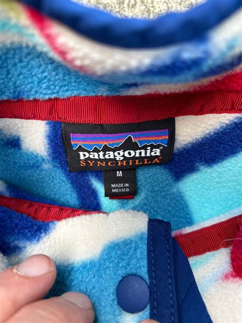 Patagonia Small Synchilla Feather Print Fleece Pullover Beautiful