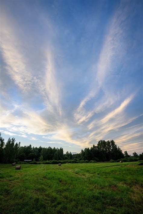 Dramatic Dark Red Clouds In Sunset Over Countryside Fields And Forests