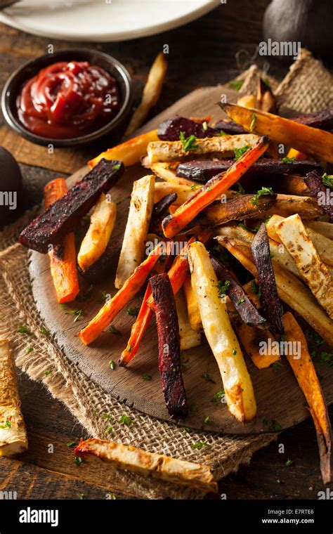 Oven Baked Vegetable Fries With Carrots Potato And Beets Stock Photo