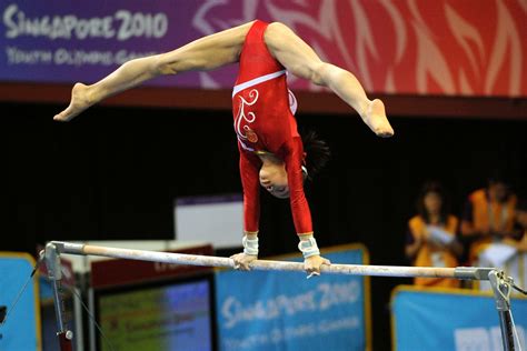 Tan Sixin On Uneven Bars At The 2010 Youth Olympic Games In Singapore