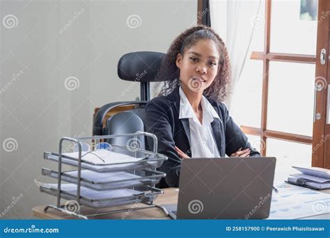 African American Businesswoman Working In The Office Using Laptops