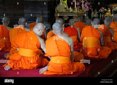 Orange Robed Monks Pray Praying Chant Chanting Wat Pho Temple Of The