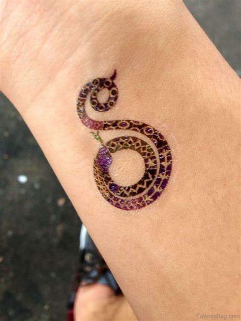 47 Unique Snake Tattoos For Wrist - Tattoo Designs – TattoosBag.com