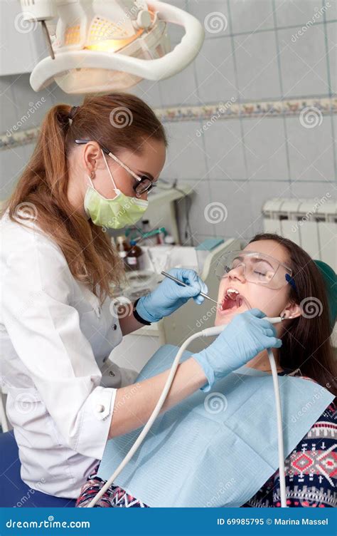 Woman Dentist At Work With Patient Stock Image Image Of Control