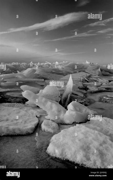 Lake Michigan Shore Ice Turns Blue In The Twlight Shade On The