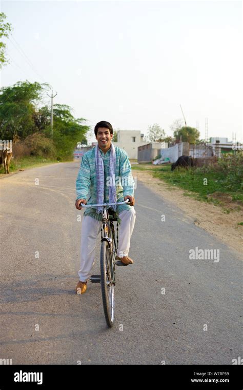 Indian Man Riding Bicycle Hi Res Stock Photography And Images Alamy