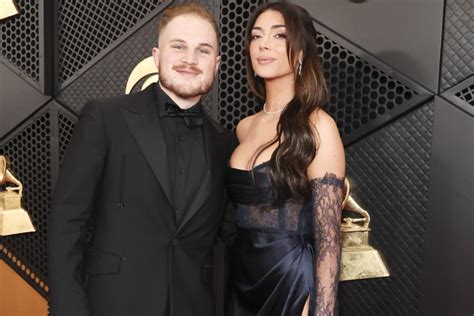 Zach Bryan And Brianna Chickenfry Flaunt Romance On GRAMMY Awards Red