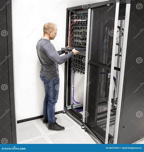 It Technician Install Network Rack in Datacenter Stock Photo - Image of ...