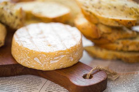 Premium Photo | Camembert on board. cheese for advertising. for a large board. bree from the ...