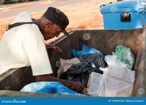 Homeless Man Digging Through Trash Editorial Stock Image Image Of