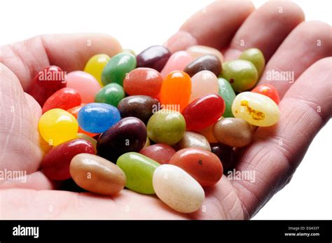 Fruit Jelly Beans On Hand On White Background Stock Photo Alamy