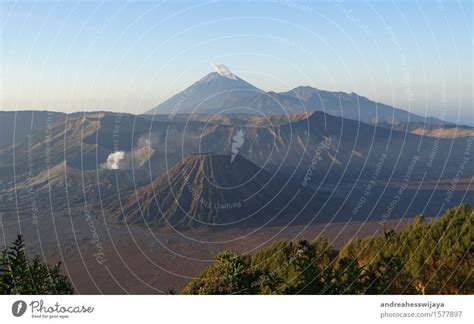 Two active volcanoes in Java, Indonesia - a Royalty Free Stock Photo ...