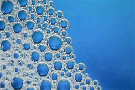 Premium Photo | Blue soap bubbles in macro