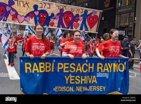 New York New York May 22 Participants Holding Israeli Flags And Signs March Up Fifth Avenue