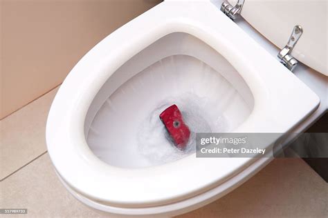 Mobile Phone In Toilet High Res Stock Photo Getty Images